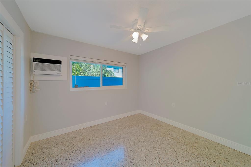 13248 4th Street East, Unit B Madeira Beach, FL 33708 - Photo 22 of 49 an empty room with a window
