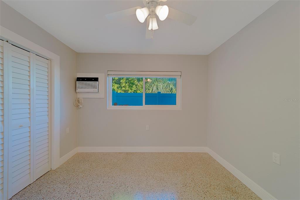 13248 4th Street East, Unit B Madeira Beach, FL 33708 - Photo 23 of 49 an empty room with a window