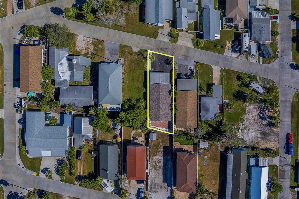 13248 4th Street East, Unit B Madeira Beach, FL 33708 - Photo 48 of 49 an aerial view of houses with outdoor space