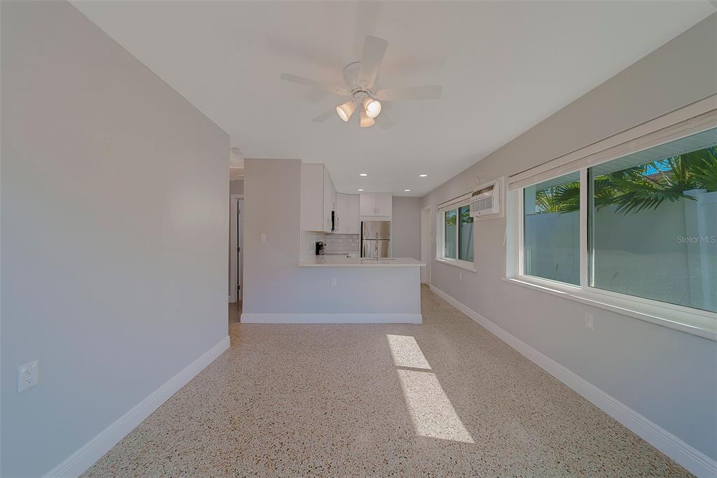 13248 4th Street East, Unit B Madeira Beach, FL 33708 - Photo 9 of 49 a view of an empty room with a window