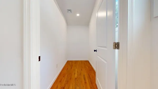 a view of a dining room with furniture and window