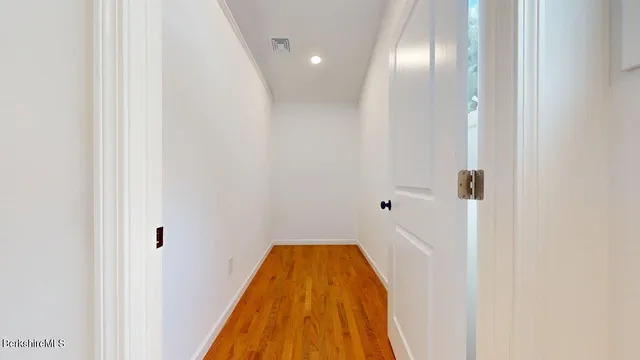 a view of a dining room with furniture and window