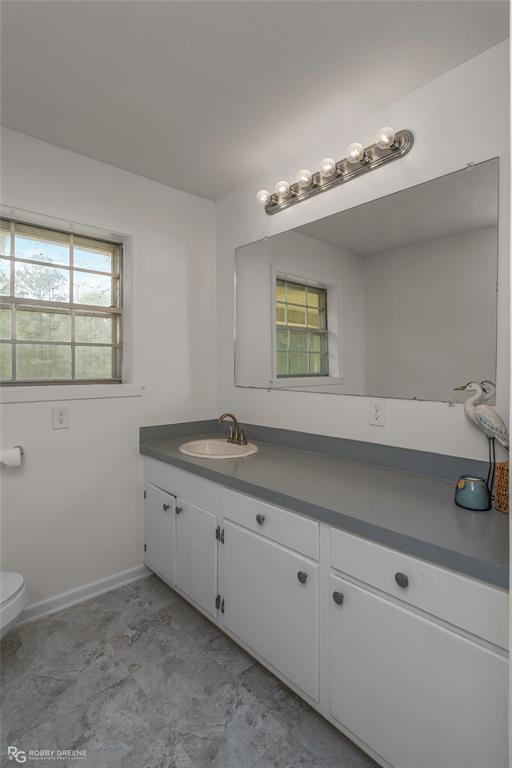 1303 Young Road Benton, LA 71006 - Photo 24 of 34 Bathroom featuring vanity and toilet