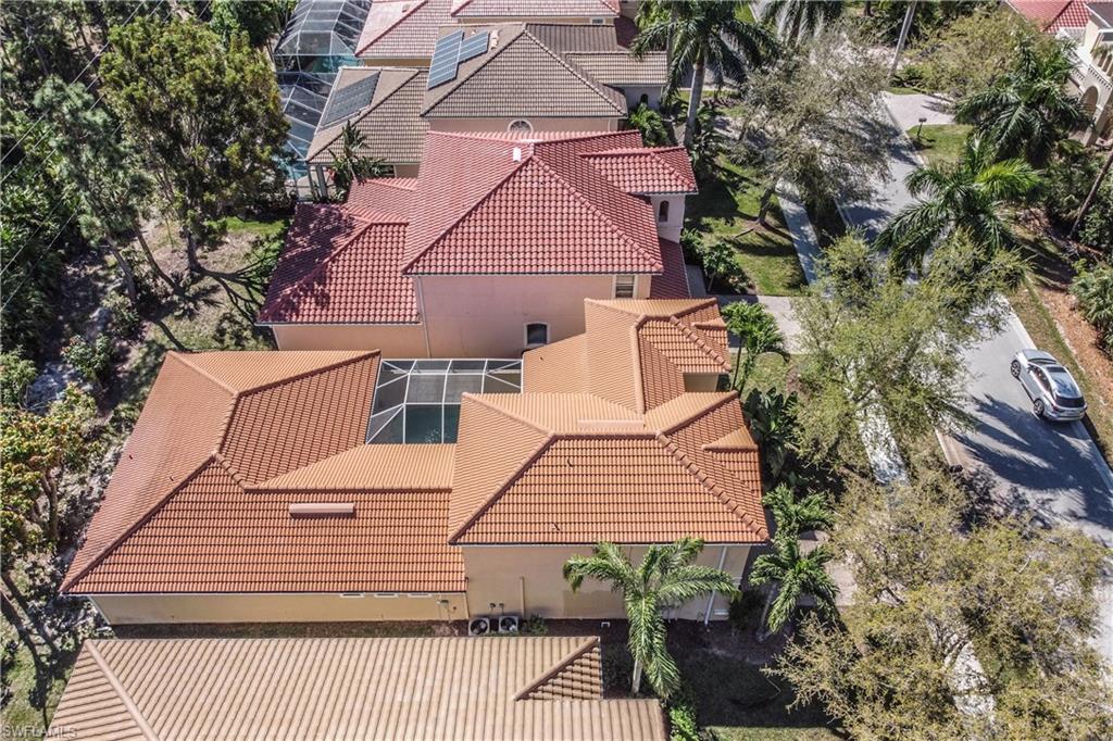 5738 Lago Villaggio Way Naples, FL 34104 - Photo 22 of 28 an aerial view of a house