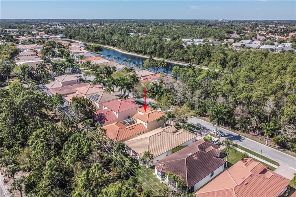 5738 Lago Villaggio Way Naples, FL 34104 - Photo 25 of 28 an aerial view of a city