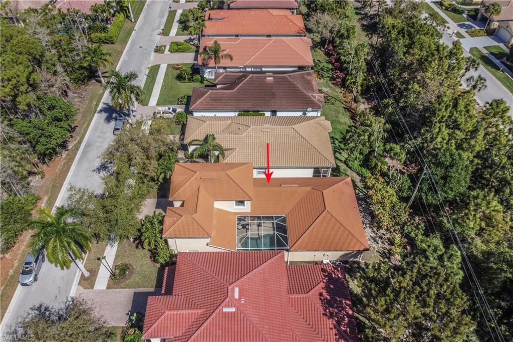 5738 Lago Villaggio Way Naples, FL 34104 - Photo 28 of 28 an aerial view of a house