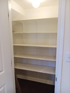 12004 Terraza Circle, Unit TH32 Austin, TX 78726 - Photo 20 of 25 a view of a closet with white walls