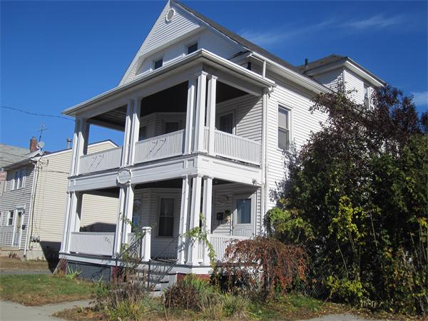 35 Lenox Street Springfield, MA 01108 - Photo 23 of 24 a front view of a house with a yard
