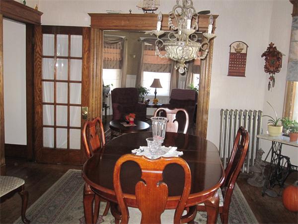 35 Lenox Street Springfield, MA 01108 - Photo 3 of 24 a view of a dining room with furniture and chandelier
