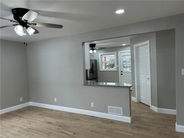 wooden floor and window in a room