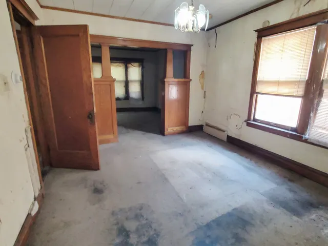 an empty room with windows