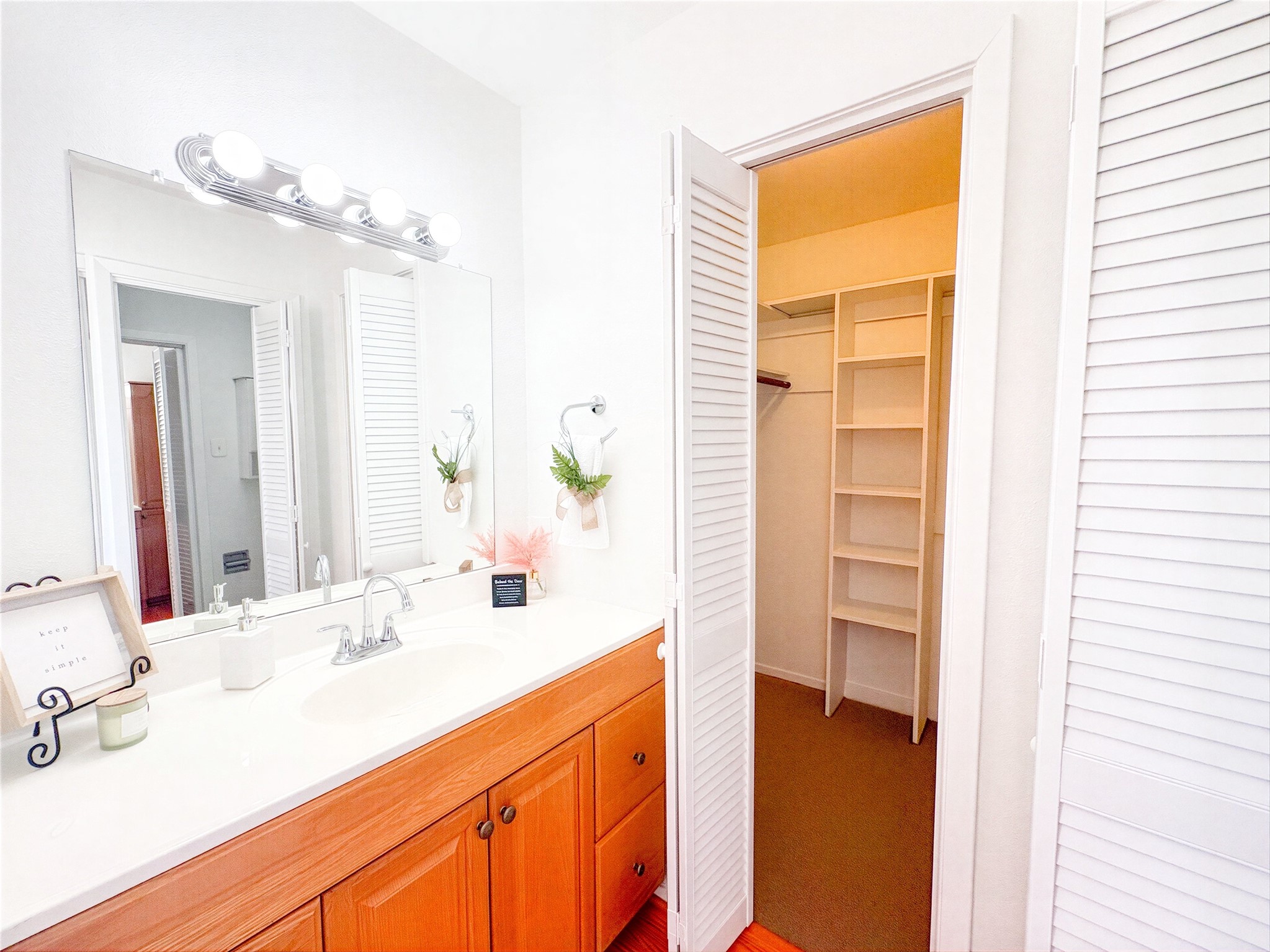 4135 Young Street Pasadena, TX 77504 - Photo 16 of 29 a bathroom with a sink and a mirror