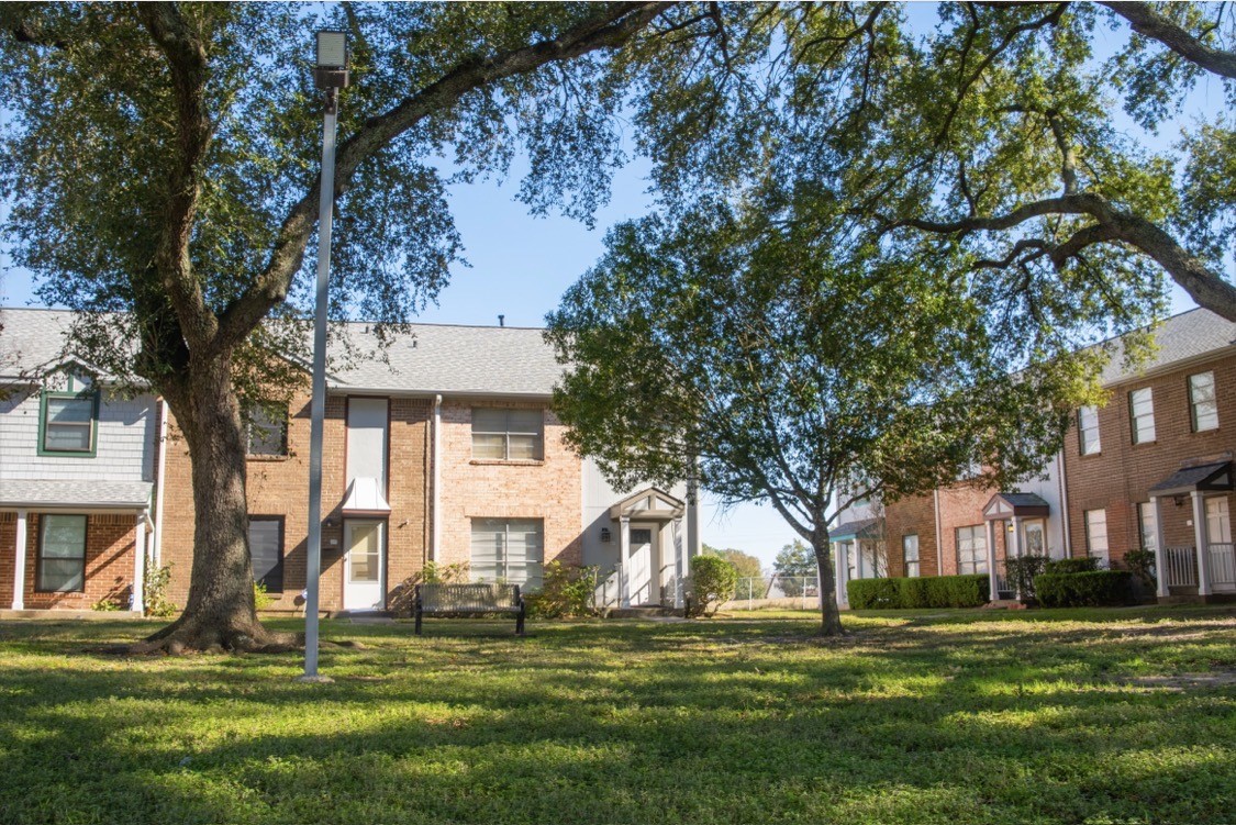 4135 Young Street Pasadena, TX 77504 - Photo 28 of 29 a front view of a building with trees