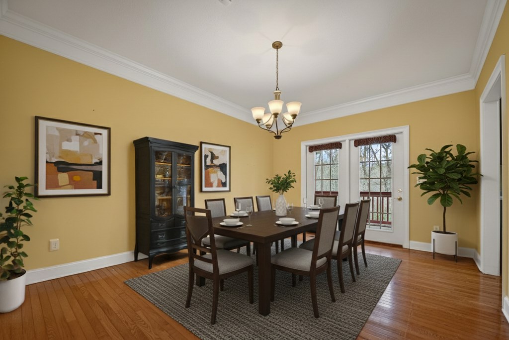 220 Oak Rdg Lane Ellijay, GA 30536 - Photo 11 of 36 a view of a dining room with furniture and wooden floor
