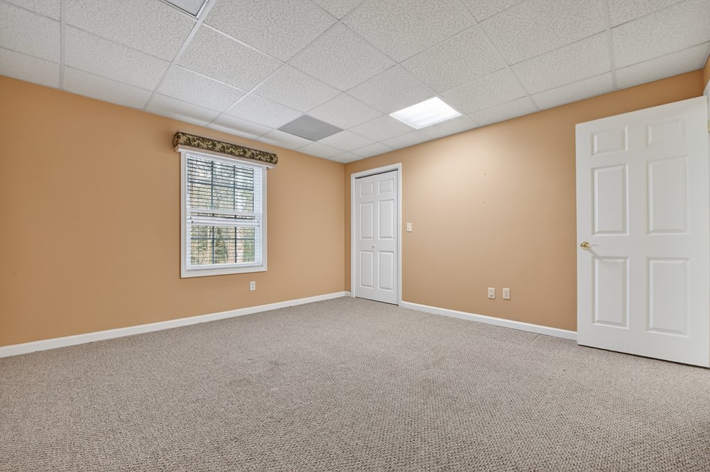 220 Oak Rdg Lane Ellijay, GA 30536 - Photo 26 of 36 an empty room with windows