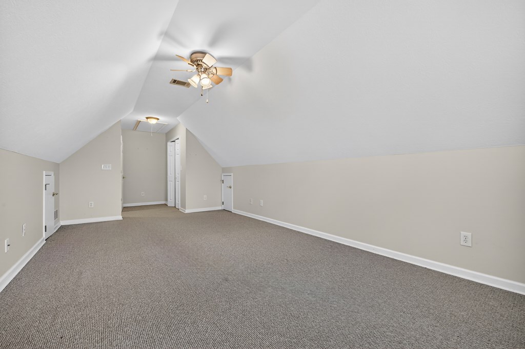 220 Oak Rdg Lane Ellijay, GA 30536 - Photo 30 of 36 a view of a room with a chandelier fan and a window