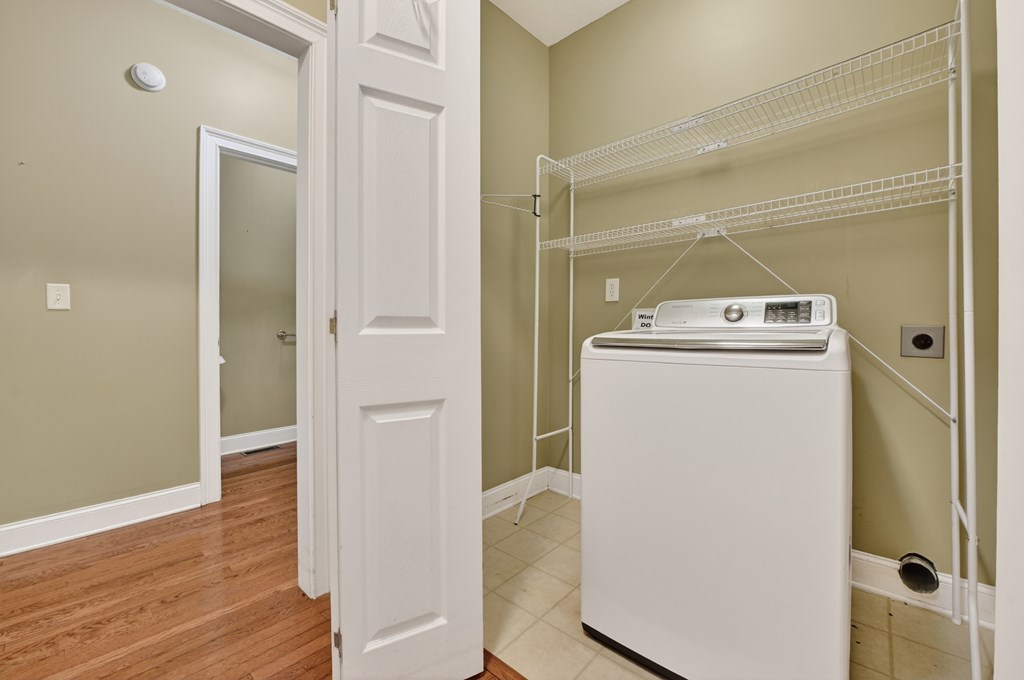 220 Oak Rdg Lane Ellijay, GA 30536 - Photo 31 of 36 a utility room with wooden floor washer and dryer