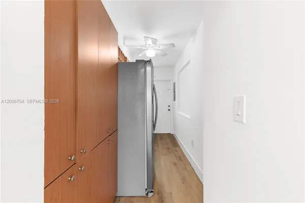 a view of a hallway with closet