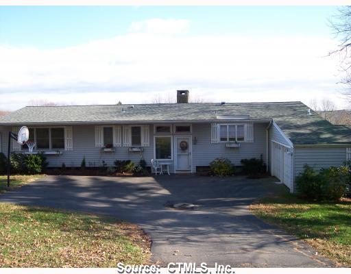 332 Sperry Road Bethany, CT 06524 - Photo 1 of 1 a front view of a house with garden