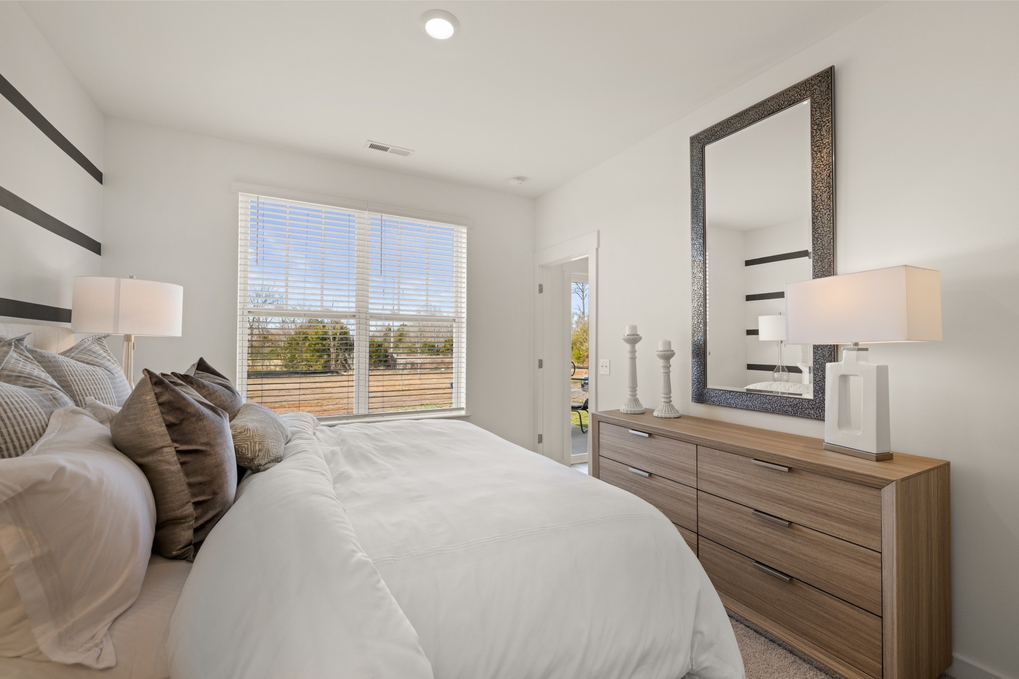 459 Alcott Way Spring Hill Spring Hill, TN 37174 - Photo 8 of 19 a bed room with a bed and a night stand