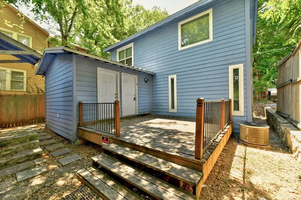 a view of a backyard with cabin