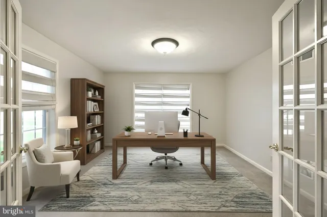 a view of a livingroom with furniture and a chandelier