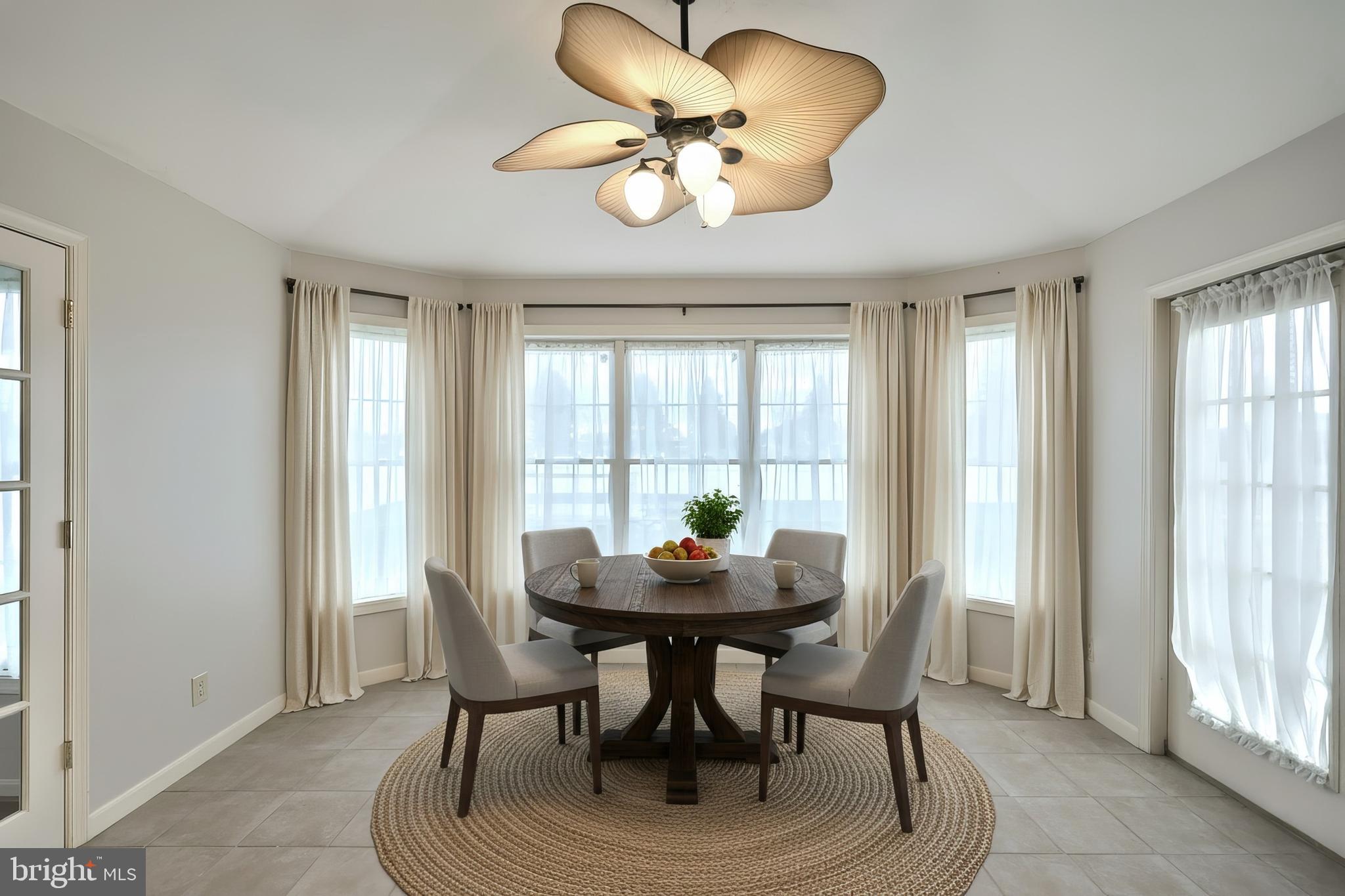 37 Amanda Drive Littlestown, PA 17340 - Photo 28 of 70 a dining room with furniture a chandelier and a rug