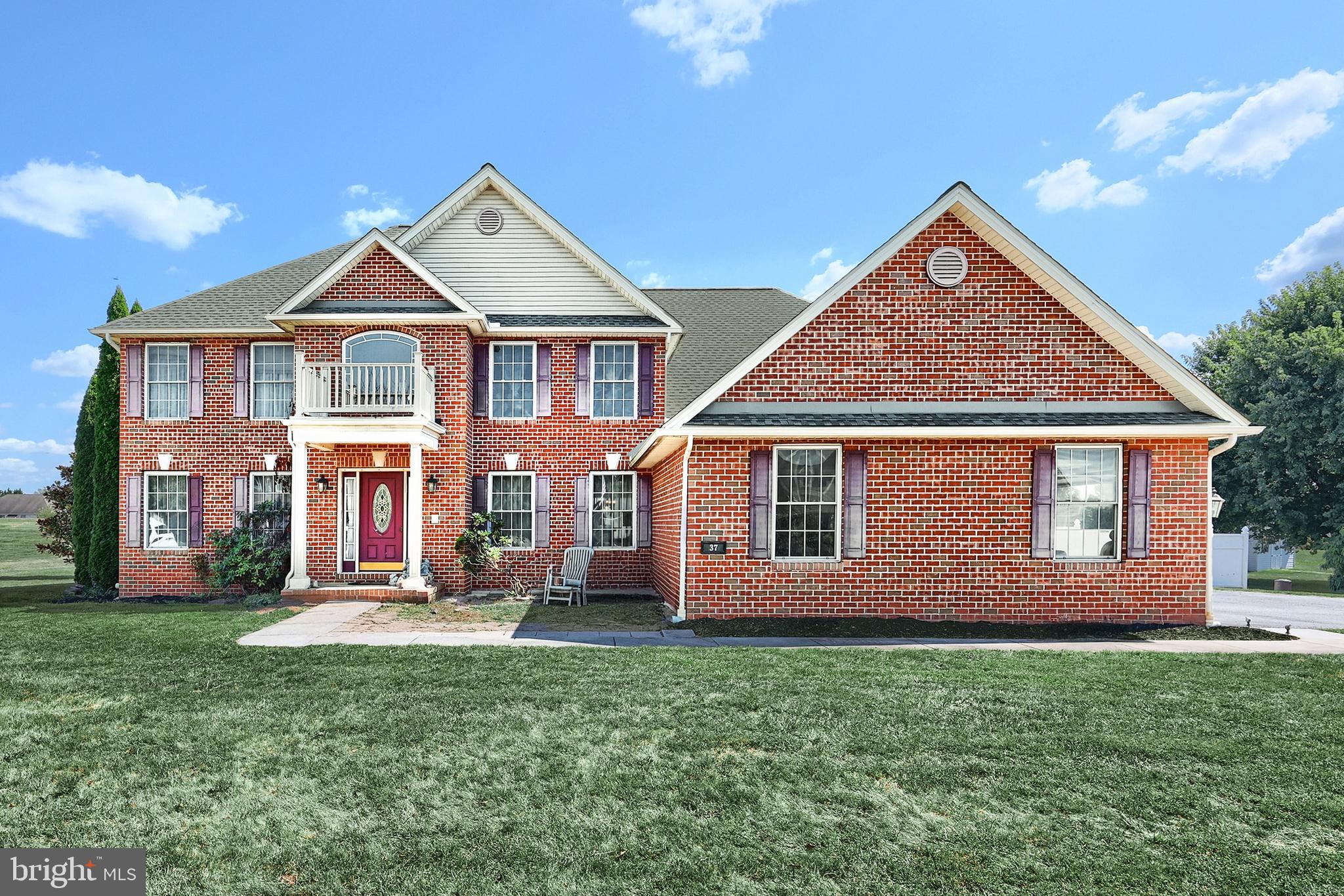 37 Amanda Drive Littlestown, PA 17340 - Photo 3 of 70 a front view of a house with a yard
