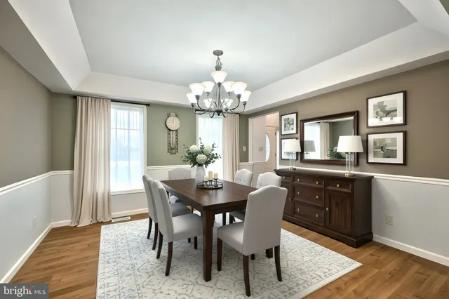 a bedroom with furniture and windows