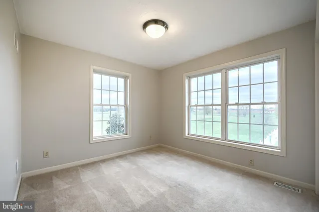 a bathroom with a double vanity sink mirror and double