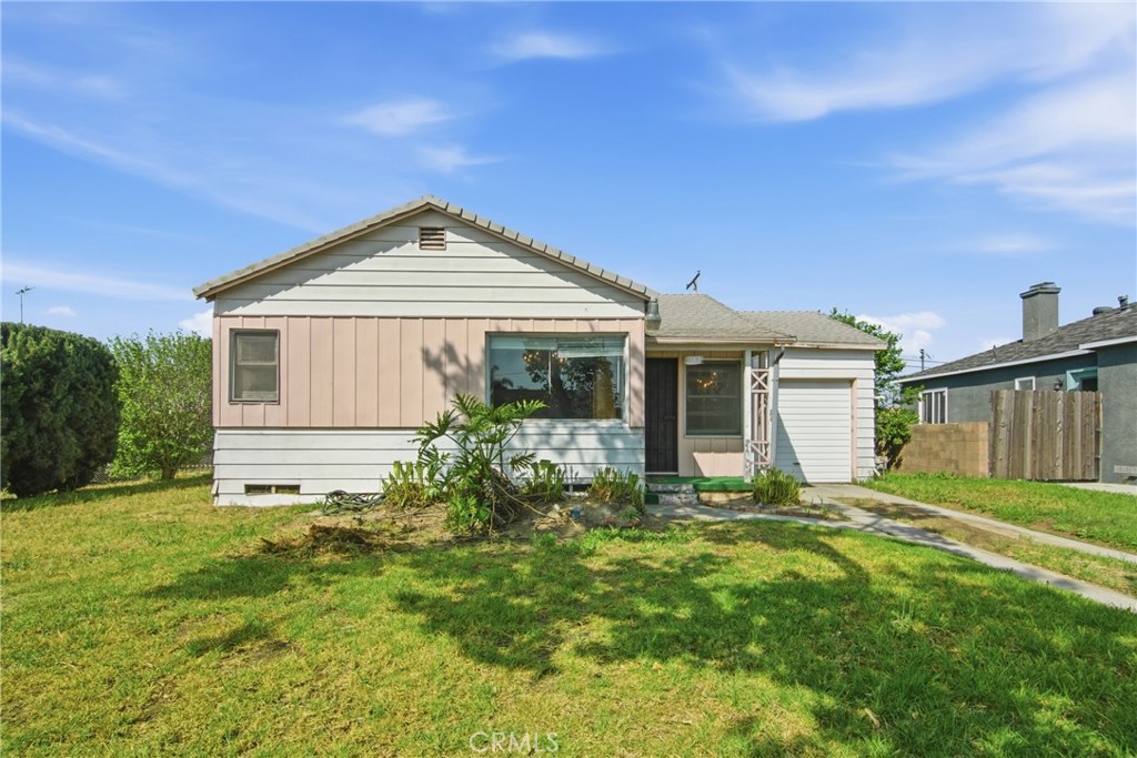 615 North Grandee Avenue Compton, CA 90220 - Photo 1 of 14 a house view with a garden space