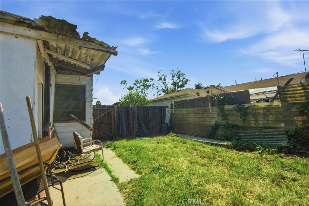 615 North Grandee Avenue Compton, CA 90220 - Photo 14 of 14 a view of a chair and table in the backyard