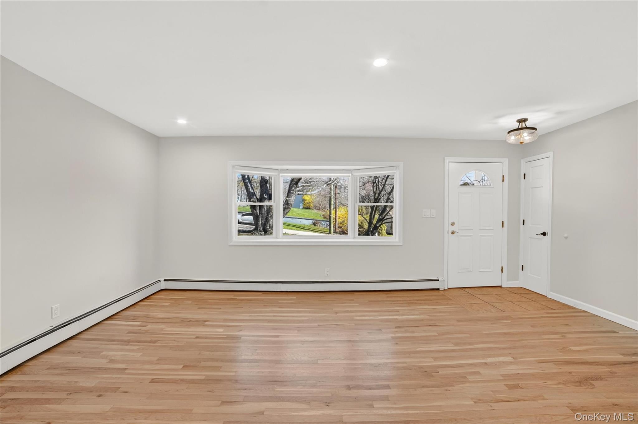 9 Ridge Road Cortlandt Manor, NY 10567 - Photo 6 of 47 View of the Bow window and stunning Oak floors