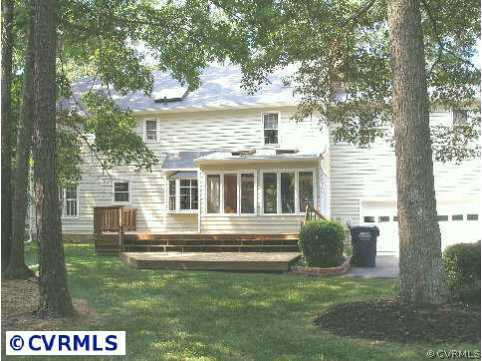 5321 Copperpenny Road Chesterfield, VA 23832 - Photo 2 of 10 a front view of a house with a garden