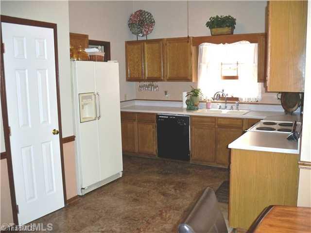 1408 Wiley Lewis Road Greensboro, NC 27406 - Photo 7 of 15 Kitchen.