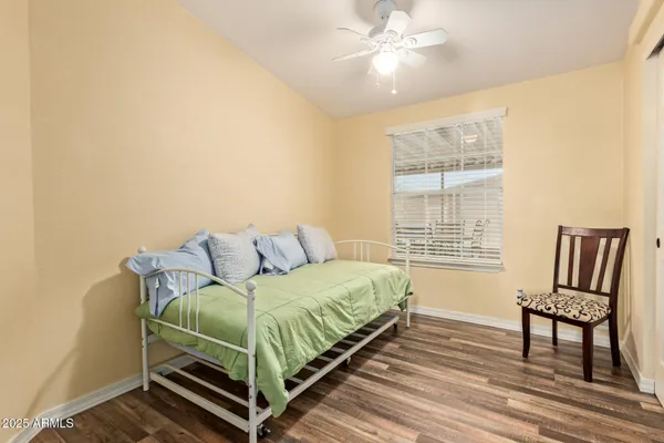 a view of swimming pool with outdoor seating and plants