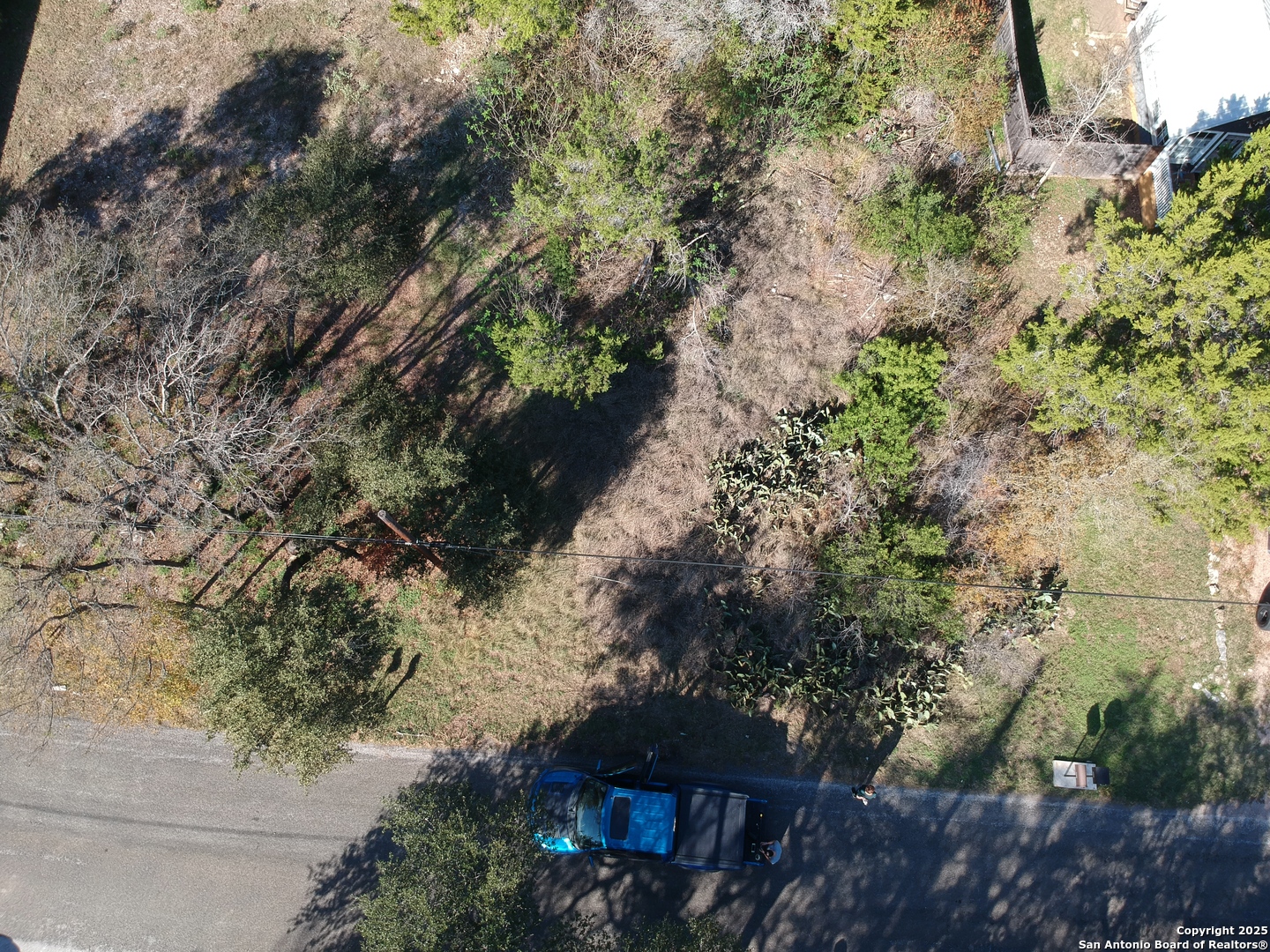 10906 3rd Street Jonestown, TX 78645 - Photo 2 of 9 a view of a house with a yard