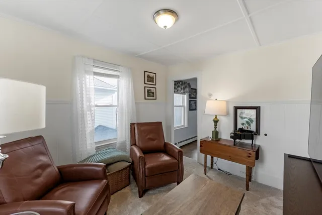 a kitchen with sink stove and cabinets