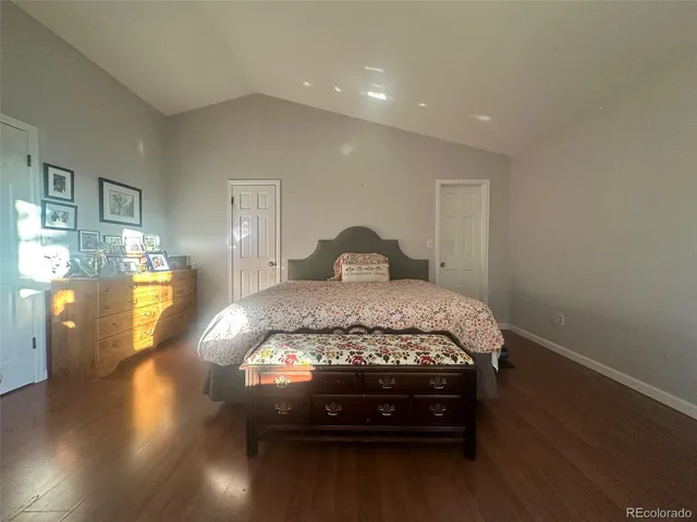 a bed room with a bed and a window