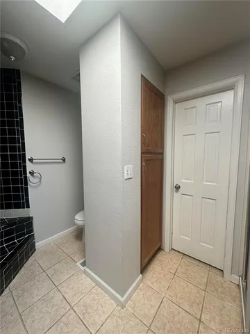 a bathroom with a sink a toilet and vanity