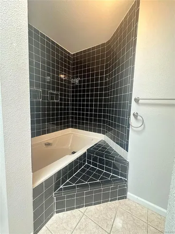 a front view of house with garden