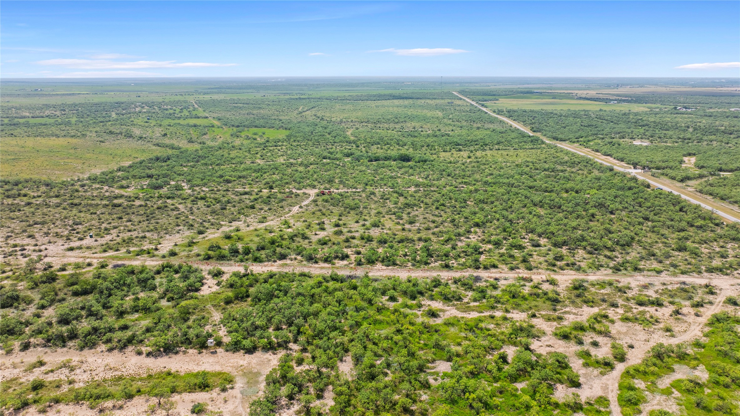 0 Fm 2647 Ballinger, TX 76821 - Photo 14 of 17 Vast, undeveloped land extends into the horizon, offering a secluded and serene natural landscape.