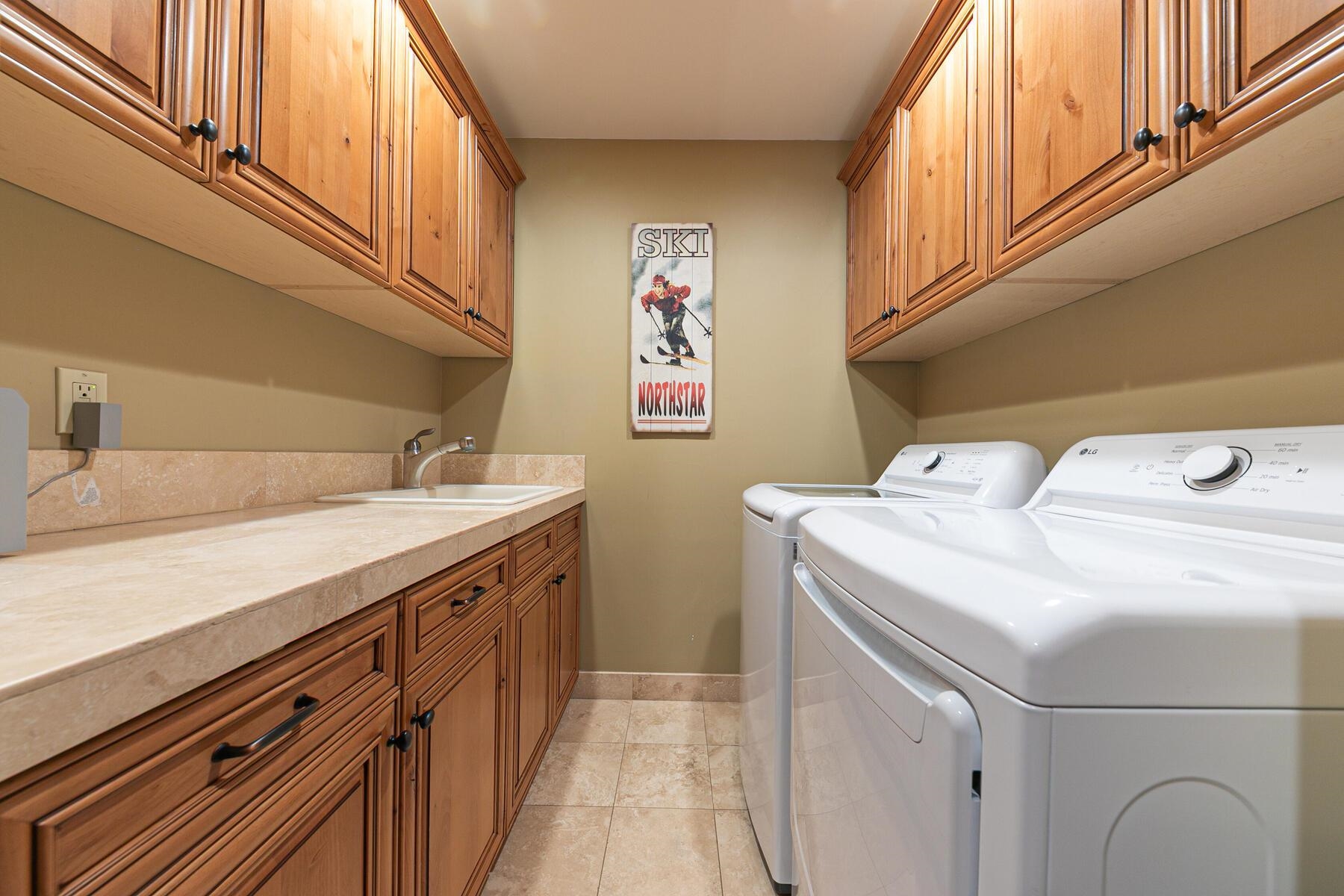 10243 Valmont Trail Truckee, CA 96161 - Photo 19 of 28 a utility room with dryer and washer