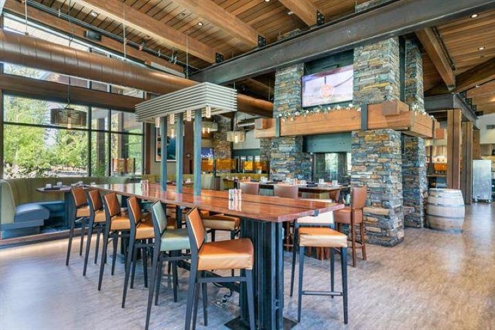 10243 Valmont Trail Truckee, CA 96161 - Photo 27 of 28 an outdoor space with a large window and dining table
