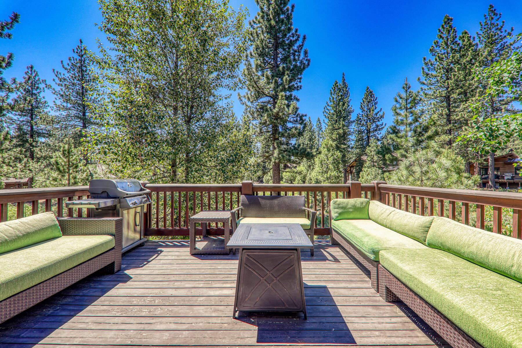 10243 Valmont Trail Truckee, CA 96161 - Photo 3 of 28 a view of a balcony with wooden floor and outdoor seating