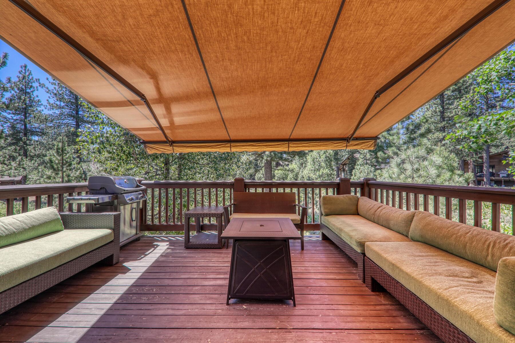 10243 Valmont Trail Truckee, CA 96161 - Photo 4 of 28 a balcony with wooden floor and outdoor seating