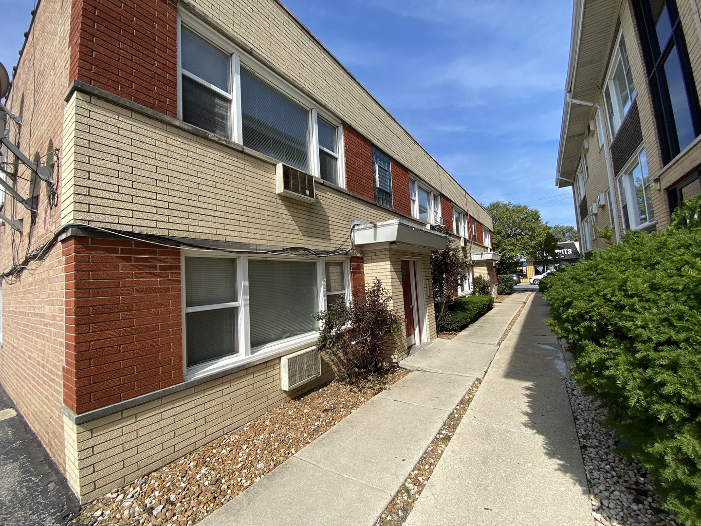 4345 West 63rd Street, Unit 2D Chicago, IL 60629 - Photo 2 of 12 a view of a house with a yard