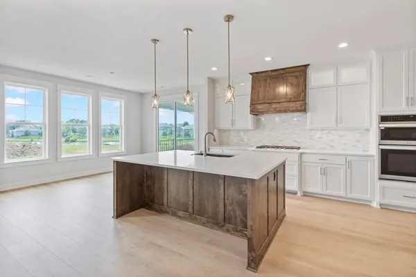 $669,900 | 1309 Larkspur Place, Raymore, MO 64083