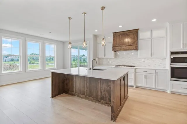 $669,900 | 1309 Larkspur Place, Raymore, MO 64083