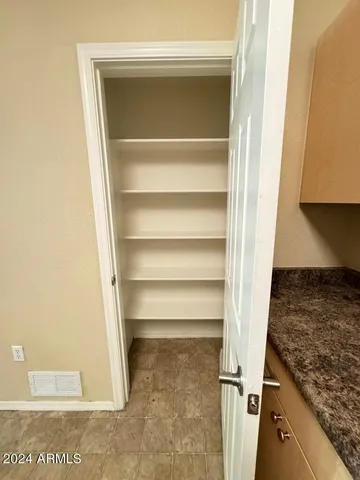 a view of storage and utility room